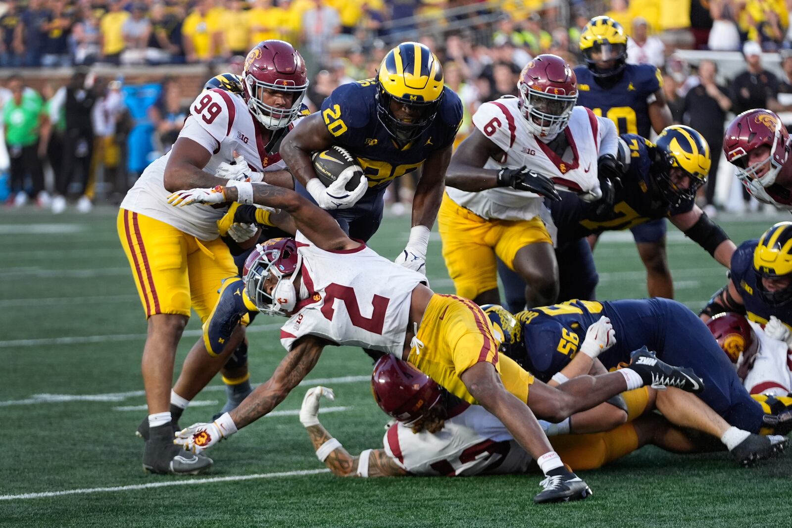 Michigan running back Kalel Mullings (20) runs against Southern California in the second half of an NCAA college football game in Ann Arbor, Mich., Saturday, Sept. 21, 2024. (AP Photo/Paul Sancya)