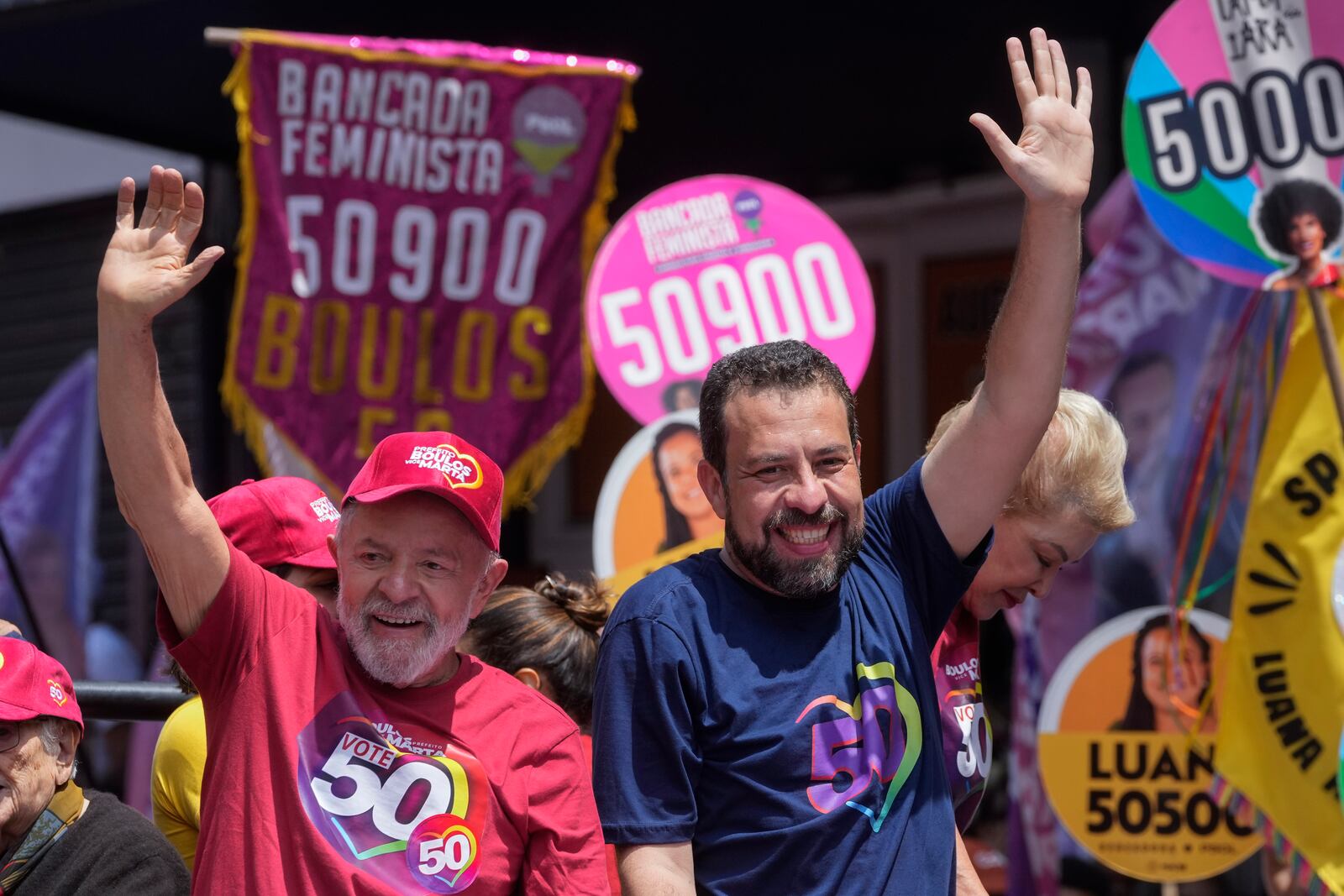 Brazilian President Luiz Inacio Lula da Silva, left, campaigns with mayoral candidate Guilherme Boulos of the Socialism and Liberty Party the day before elections in Sao Paulo, Saturday, Oct. 5, 2024. (AP Photo/Andre Penner)