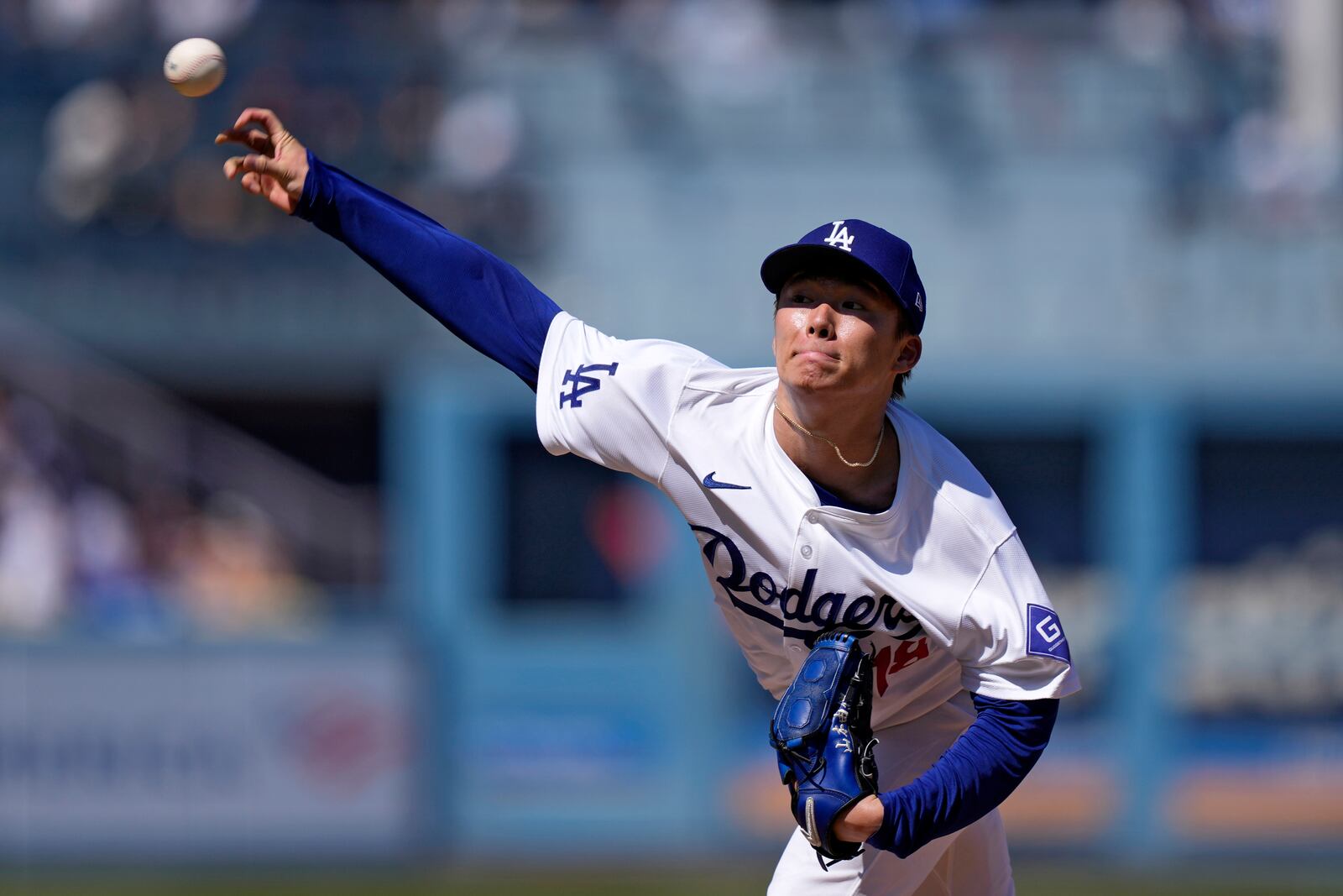 Los Angeles Dodgers starting pitcher Yoshinobu Yamamoto throws to the plate during the second inning of a baseball game against the Colorado Rockies, Sunday, Sept. 22, 2024, in Los Angeles. (AP Photo/Mark J. Terrill)