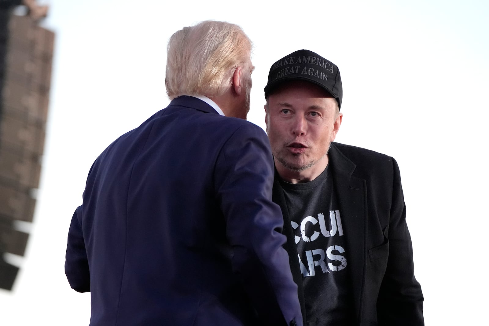 Republican presidential nominee former President Donald Trump, left, and Tesla and SpaceX CEO Elon Musk appear on stage at a campaign event at the Butler Farm Show, Saturday, Oct. 5, 2024, in Butler, Pa. (AP Photo/Alex Brandon)