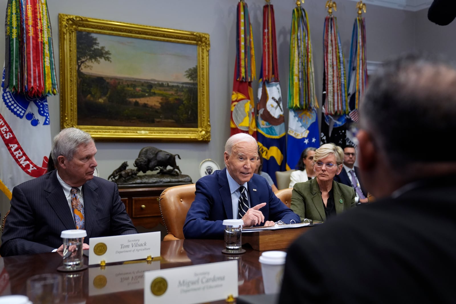 President Joe Biden delivers remarks on the federal government's response to Hurricane Helene and preparations for Hurricane Milton in the Roosevelt Room of the White House, Tuesday, Oct. 8, 2024, in Washington, as Secretary of Agriculture Tom Vilsack, left, and Secretary of Energy Jennifer Granholm, right, look on. (AP Photo/Evan Vucci)