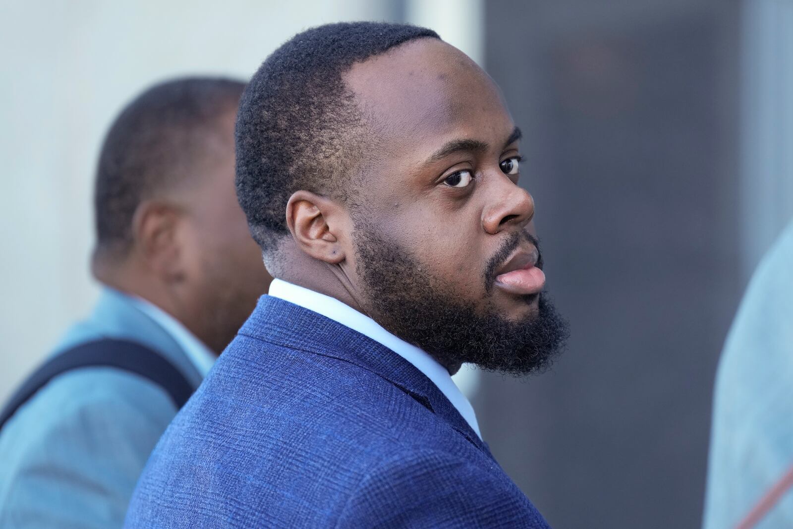 Tadarrius Bean, one of three former Memphis police officers charged in the 2023 fatal beating of Tyre Nichols, arrives at the federal courthouse for the day's proceedings Thursday, Oct. 3, 2024, in Memphis, Tenn. (AP Photo/George Walker IV)