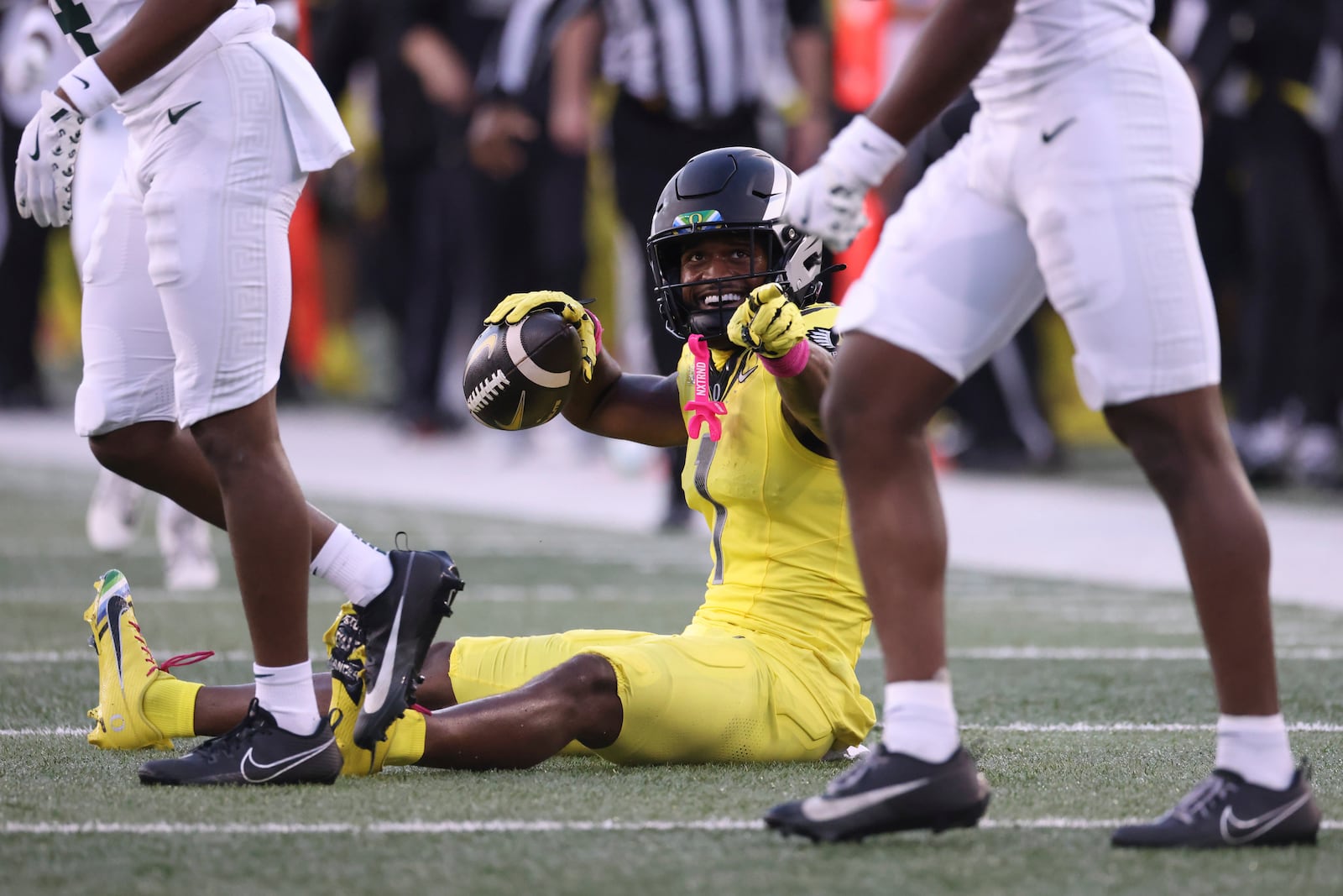 Oregon wide receiver Traeshon Holden (1) reacts after catching a pass during the first half of an NCAA college football game against Michigan State, Friday, Oct. 4, 2024, in Eugene, Ore. (AP Photo/Amanda Loman)