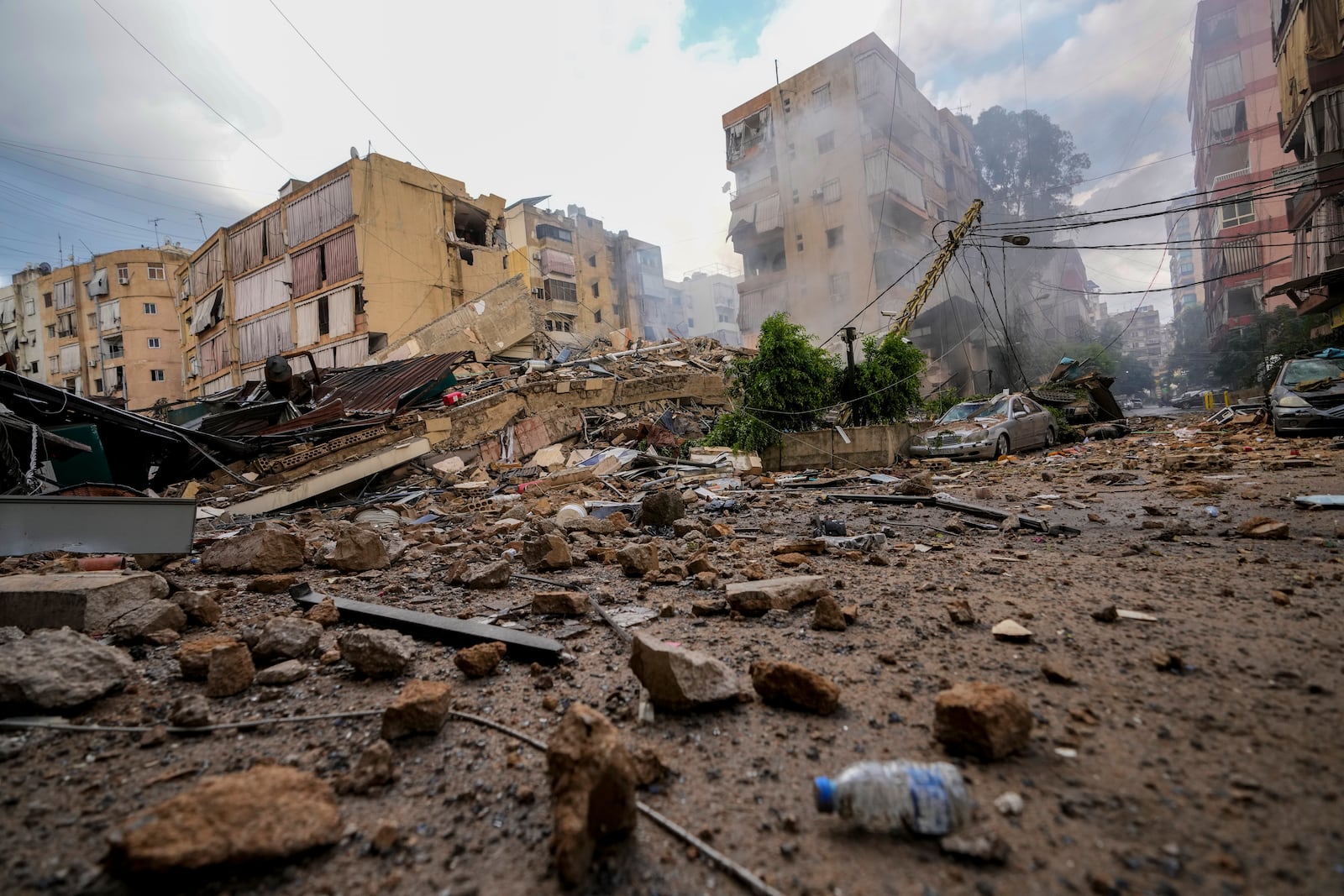 Smoke rises from the site of an Israeli airstrike in Beirut's southern suburb, Lebanon, Tuesday, Oct. 1, 2024. (AP Photo/Hassan Ammar)