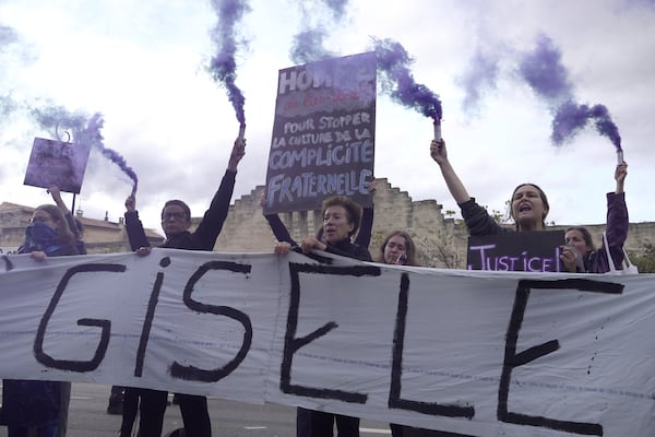 Women demonstrate to mark the International Day for the Elimination of Violence against Women, as the trial of dozens of men accused of raping Gisele Pelicot while she was drugged and rendered unconscious by her husband goes on, Monday, Nov. 25, 2024 in Avignon, southern France. (AP Photo/John Leicester)