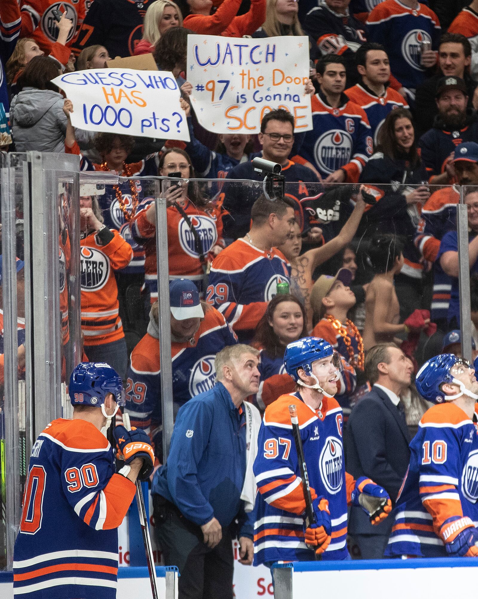 Edmonton Oilers' Connor McDavid (97) celebrates his 1000th point, against the Nashville Predators during the second period of an NHL hockey game, Thursday, Nov. 14, 2024 in Edmonton, Alberta. (Jason Franson/The Canadian Press via AP)