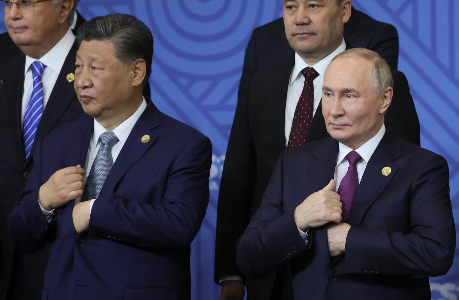 Chinese President Xi Jinping, left, and Russian President Vladimir Putin attend a family photo ceremony prior to Outreach/BRICS Plus format session at the BRICS Summit in Kazan, Russia, Thursday, Oct. 24, 2024. (Maxim Shipenkov, Pool Photo via AP)