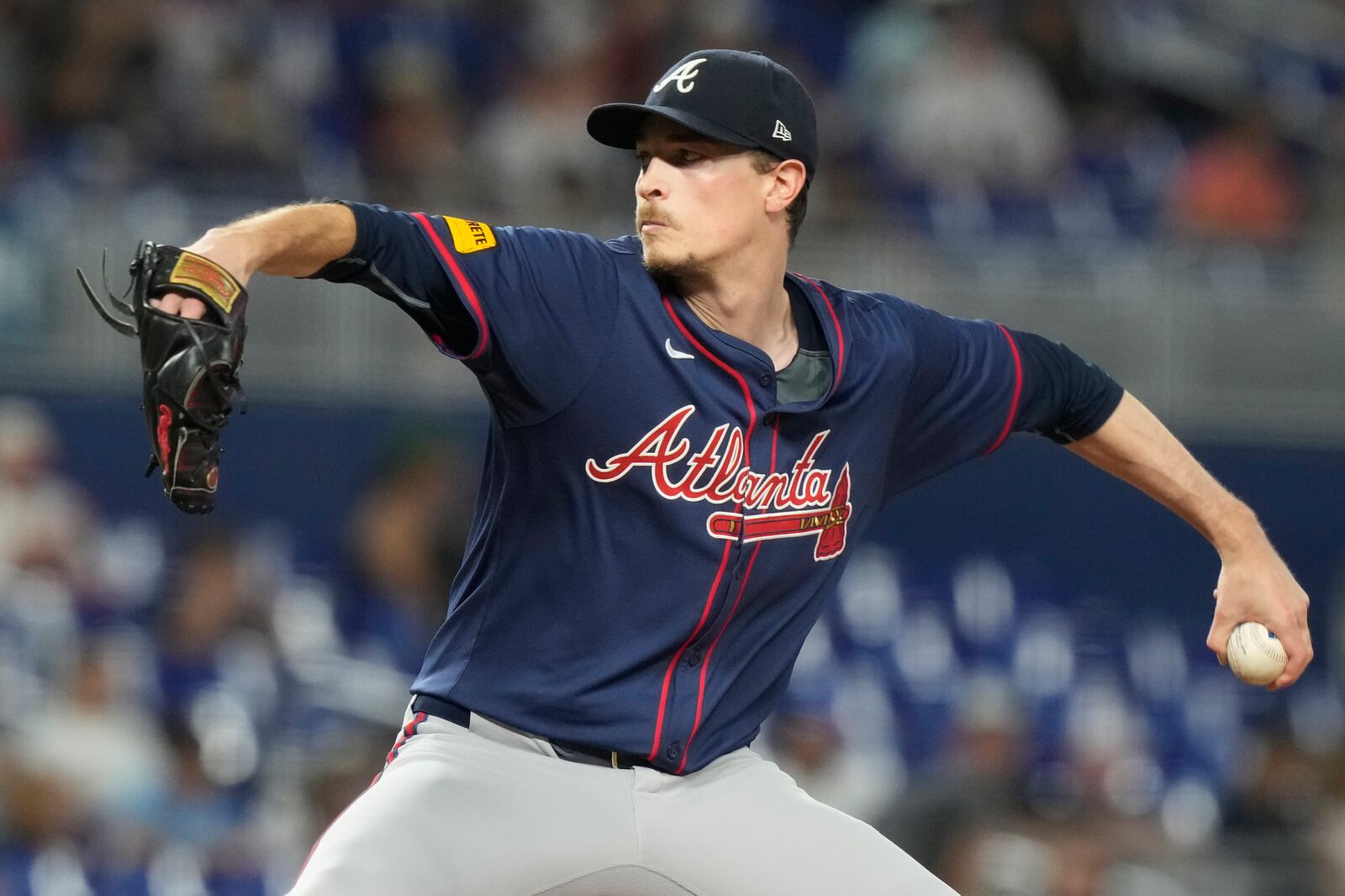 Atlanta Braves starting pitcher Max Fried aims a pitch during the third inning of a baseball game against the Miami Marlins, Saturday, Sept. 21, 2024, in Miami. (AP Photo/Marta Lavandier)