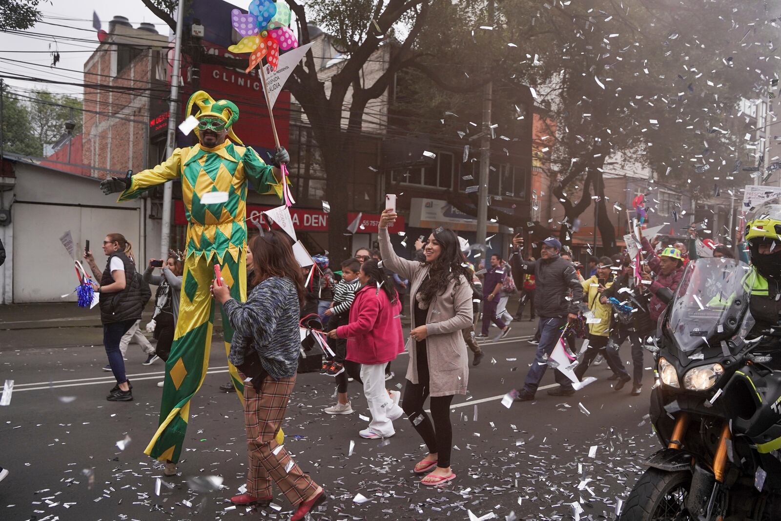 Supporters of Claudia Sheinbaum cheer as her vehicle passes on the way to her swearing-in as Mexico's new president in Mexico City, Tuesday, Oct. 1, 2024. (AP Photo/Aurea Del Rosario)