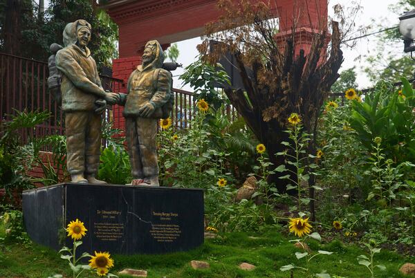 The statues of New Zealander Edmund Hillary, left, and his Sherpa guide Tenzing Norgay, who became the first climbers to reach the top of 8,850-meter (29,035-foot) Everest on May 29, 1953 is seen in Kathmandu, Nepal, Thursday, May 29, 2025. (AP Photo/Niranjan Shrestha)