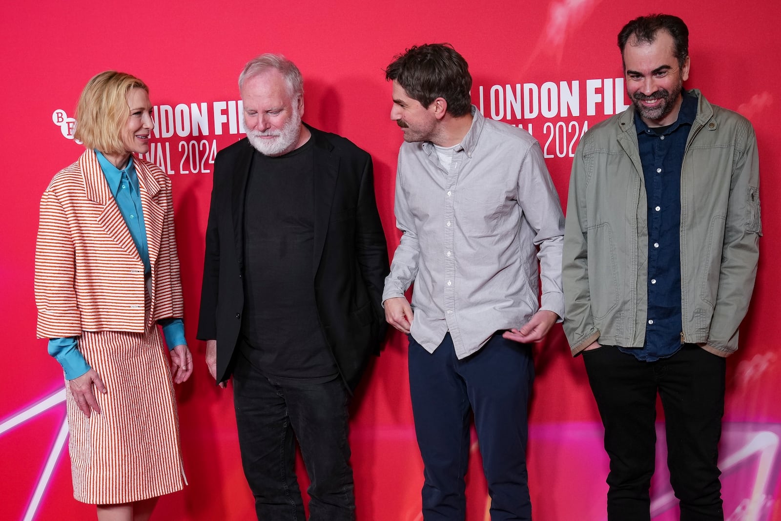 Cate Blanchett, from left, directors Guy Maddin, Evan Johnson and Galen Johnson pose for photographers upon arrival at the premiere of the film 'Rumours' during the London Film Festival on Sunday, Oct. 13, 2024, in London. (Photo by Scott A Garfitt/Invision/AP)