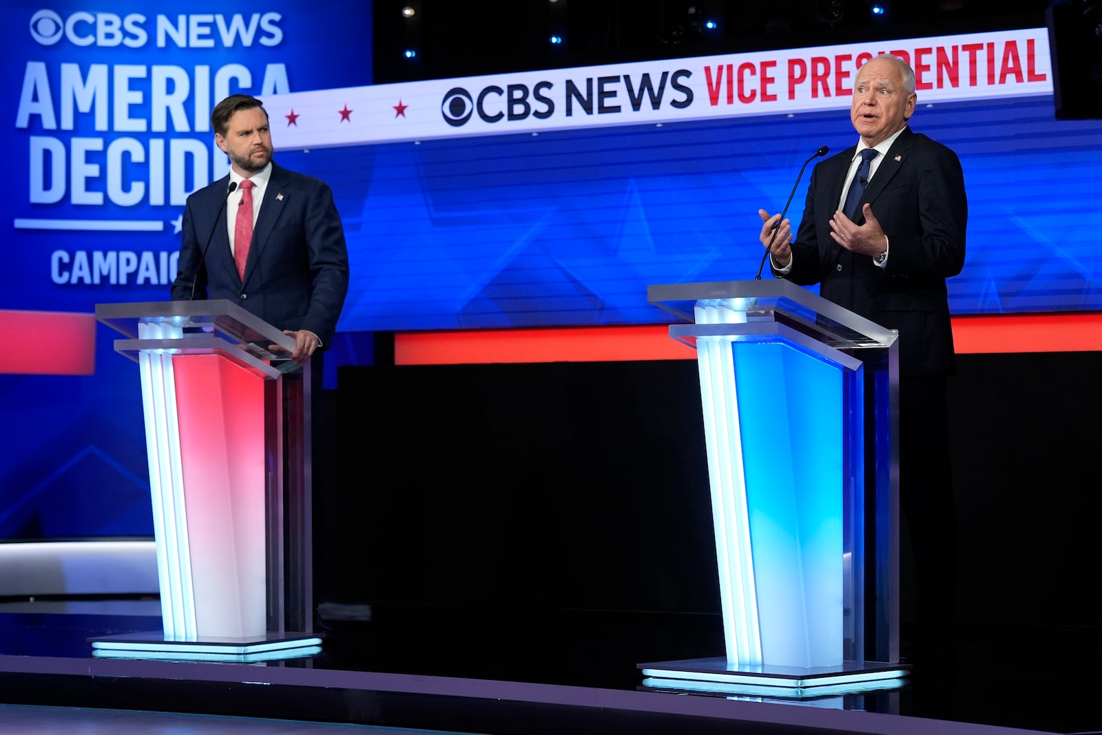 Republican vice presidential nominee Sen. JD Vance, R-Ohio, and Democratic vice presidential nominee Minnesota Gov. Tim Walz participate in vice presidential debate hosted by CBS News Tuesday, Oct. 1, 2024, in New York. (AP Photo/Matt Rourke)