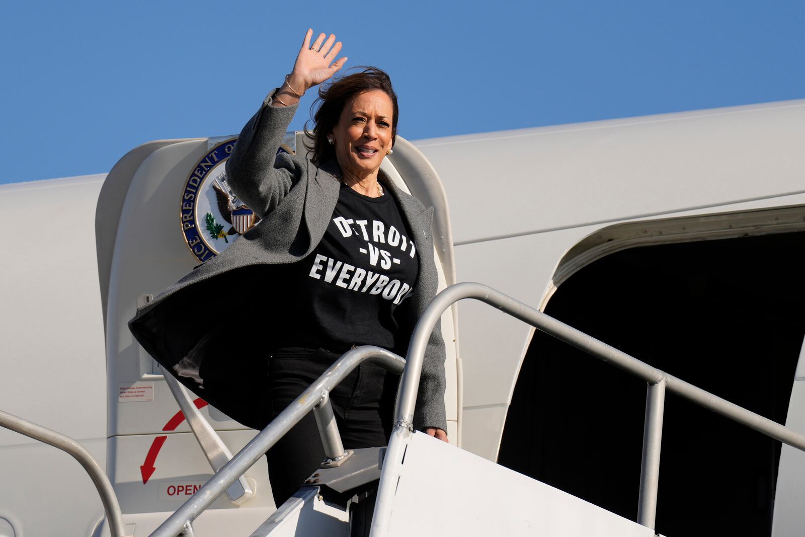 Democratic presidential nominee Vice President Kamala Harris boards Air Force Two as she departs from Detroit Metropolitan Wayne County Airport in Detroit, Saturday, Oct. 19, 2024, en route to Atlanta. (AP Photo/Jacquelyn Martin, Pool)