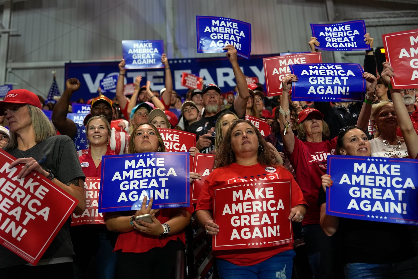 Supporters listen as Republican presidential nominee former President Donald Trump speaks at a campaign rally at Rocky Mount Event Center, Wednesday, Oct. 30, 2024, in Rocky Mount, N.C. (AP Photo/Julia Demaree Nikhinson)