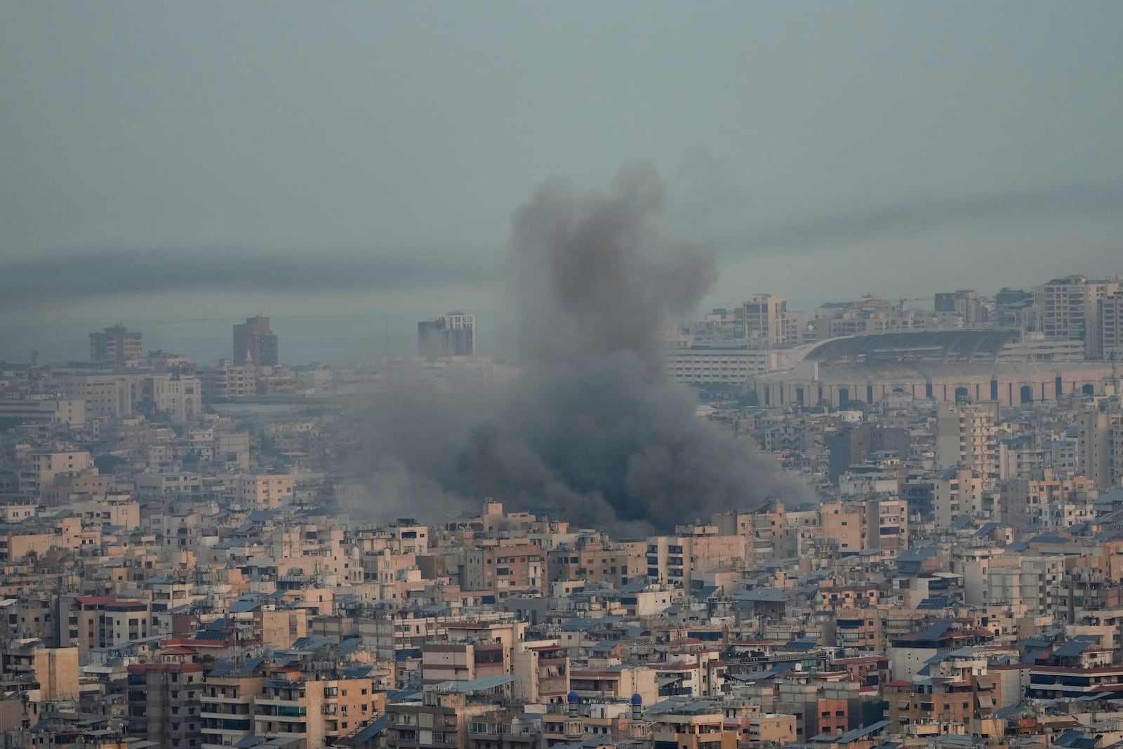 Smoke rise from Israeli airstrikes on Dahiyeh, Beirut's southern suburbs, Lebanon, Wednesday, Oct. 16, 2024. (AP Photo/Hussein Malla)