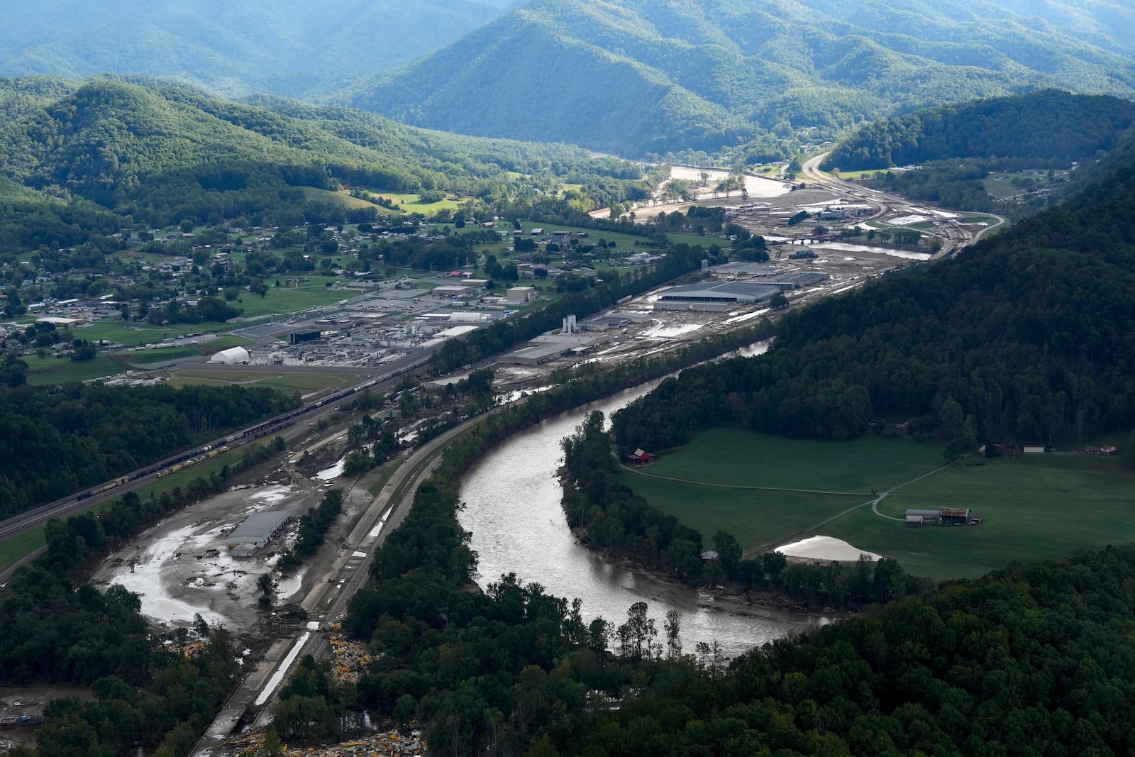 An aerial view of flood damage in the aftermath of Hurricane Helene, Saturday, Sept. 28, 2024, in Erwin, Tenn. (AP Photo/George Walker IV)