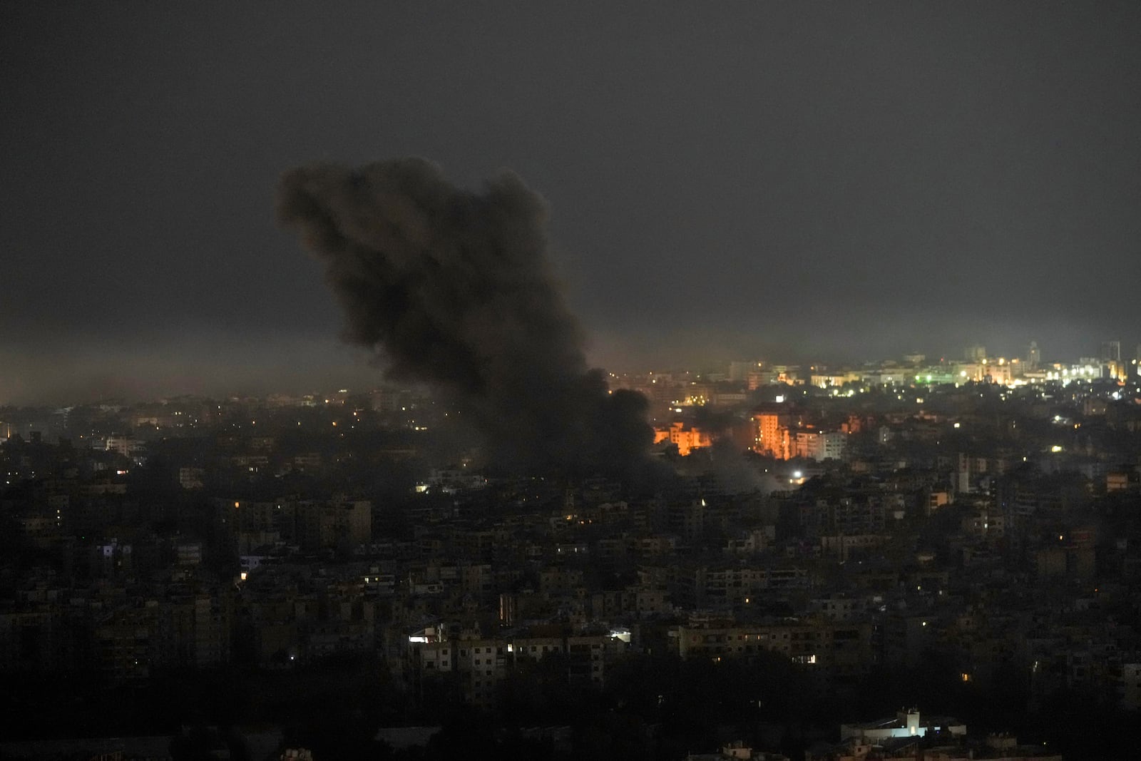 Smoke rises after Israeli airstrikes in Dahiyeh, Beirut, Lebanon, Saturday, Oct. 5, 2024. (AP Photo/Bilal Hussein)