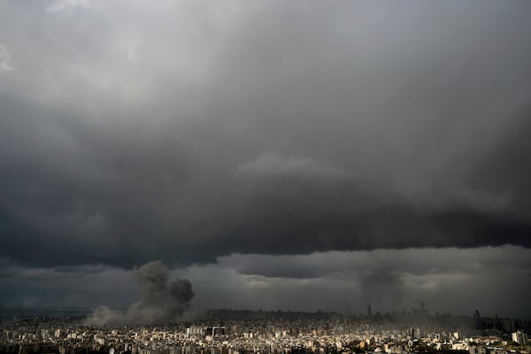 Smoke rises following an Israeli airstrike on Dahiyeh, in Beirut, Lebanon, Monday, Nov. 25, 2024. (AP Photo/Bilal Hussein)