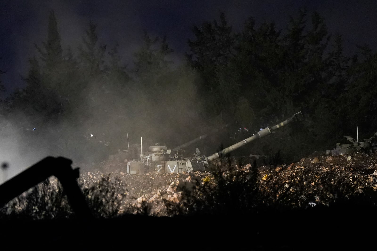 An Israeli mobile artillery unit fires a shell from northern Israel towards Lebanon, in a position near the Israel-Lebanon border, Monday, Sept. 30, 2024. (AP Photo/Baz Ratner)