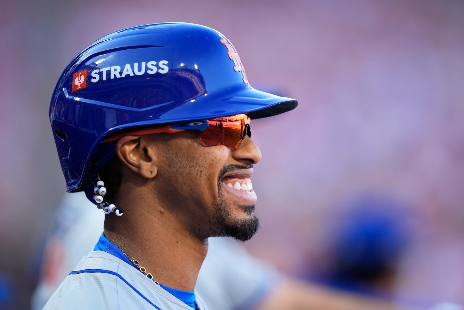 New York Mets' Francisco Lindor smiles during of the first inning of Game 2 of a baseball NL Division Series against the Philadelphia Phillies, Sunday, Oct. 6, 2024, in Philadelphia. (AP Photo/Chris Szagola)