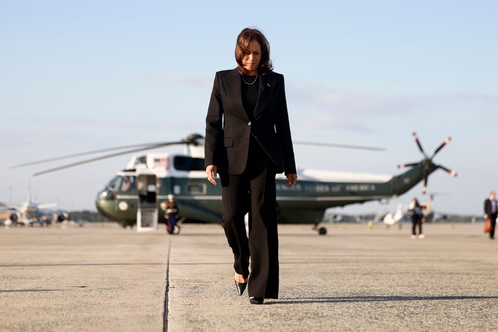 Democratic presidential nominee Vice President Kamala Harris walks from Marine Two to board Air Force Two as she departs for New York at Joint Base Andrews, Md., Monday, Oct. 7, 2024. (Evelyn Hockstein/Pool via AP)