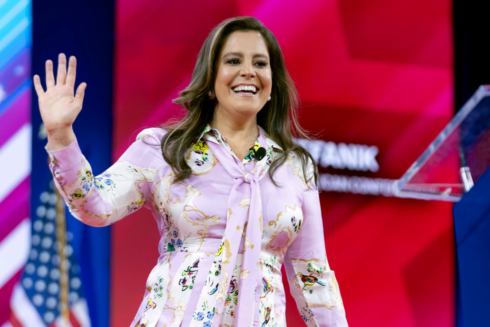 FILE - Republican Conference Chair Rep. Elise Stefanik, R-N.Y., waves to supporters at CPAC in Oxon Hill, Md., Feb. 23, 2024. President-elect Donald Trump has chosen Rep. Elise Stefanik to serve as his ambassador to the United Nations. (AP Photo/Jose Luis Magana, File)