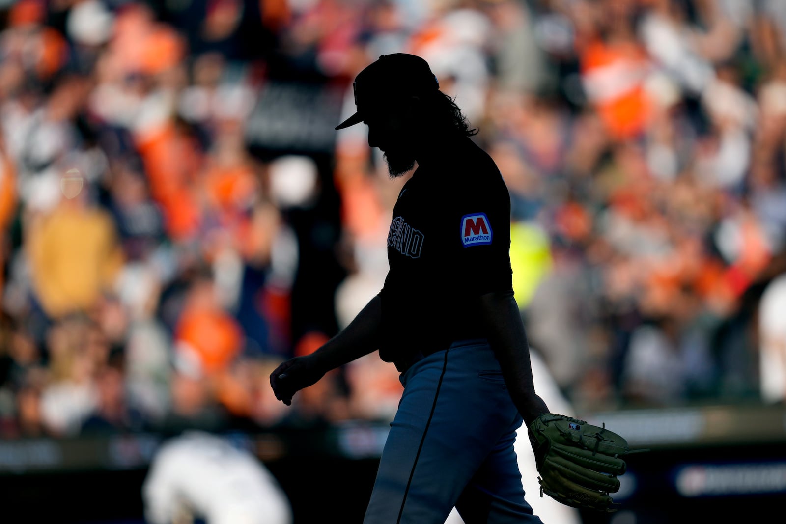 Cleveland Guardians pitcher Eli Morgan walks off the field after being taken out of the game in the sixth inning during Game 3 of a baseball American League Division Series against the Detroit Tigers, Wednesday, Oct. 9, 2024, in Detroit. (AP Photo/Paul Sancya)