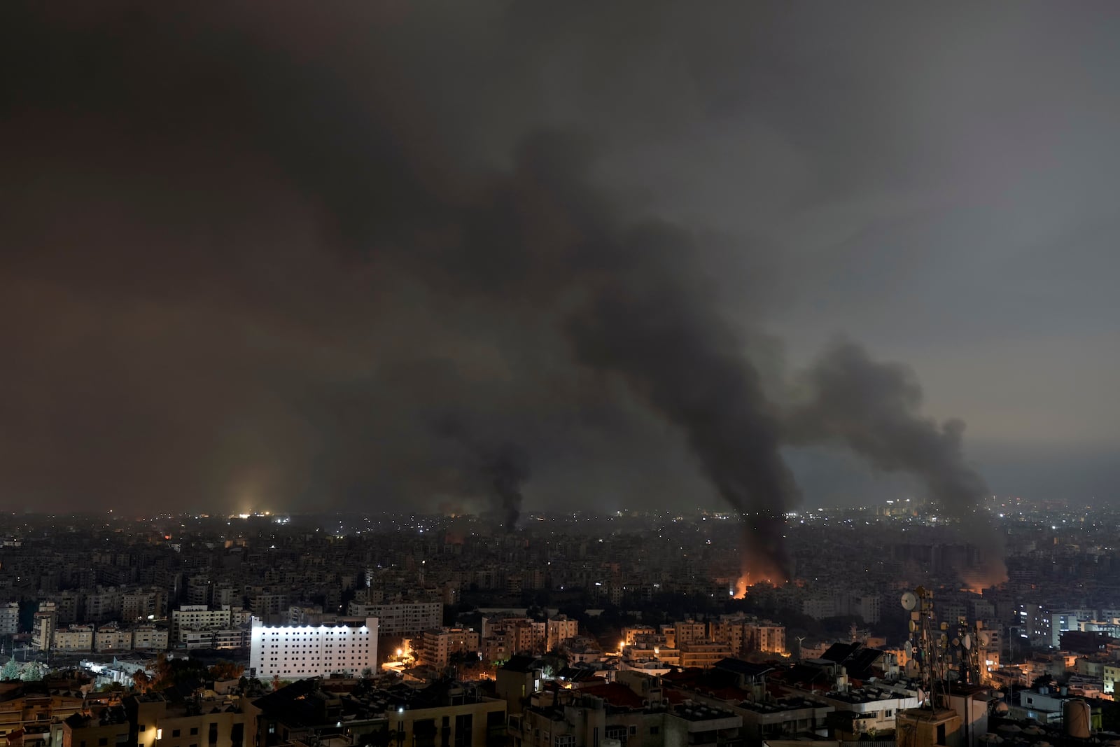 Flames and smoke rise from an Israeli airstrike in Dahiyeh, Beirut, Lebanon, early Monday, Oct. 7, 2024. (AP Photo/Bilal Hussein)