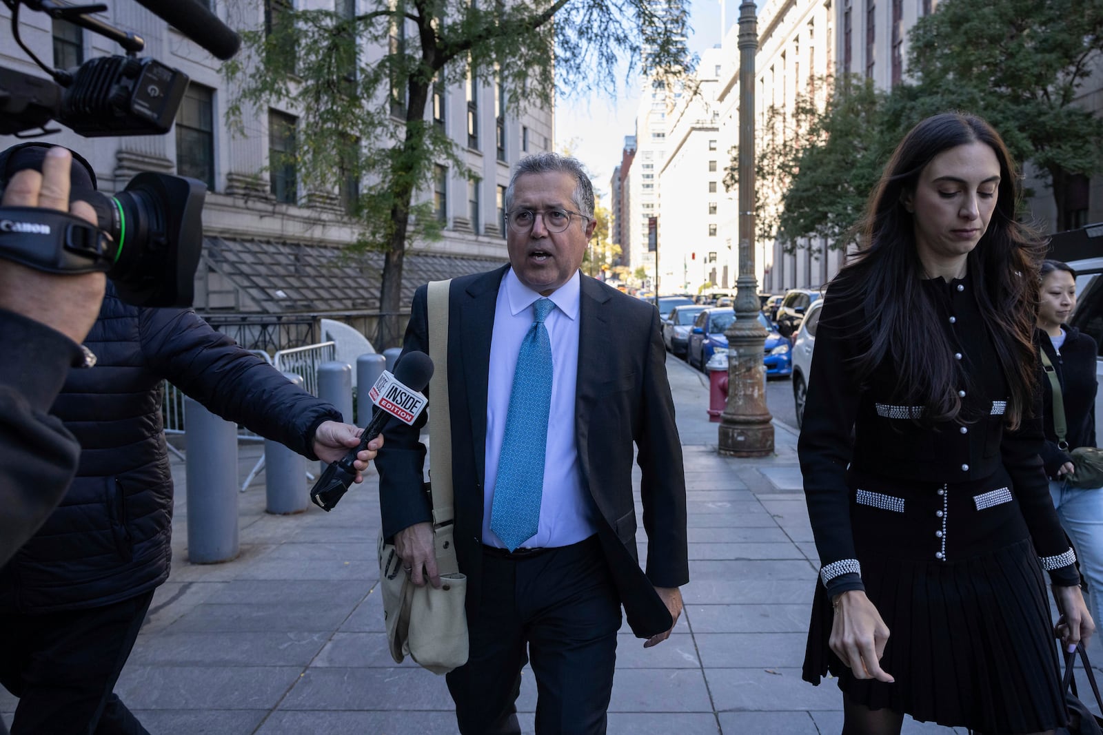 Attorney Marc Agnifilo, center, and Teny Geragos, right, for Sean "Diddy Combs, arrive at Manhattan federal court, Thursday, Oct. 10 2024, in New York. (AP Photo/Yuki Iwamura)