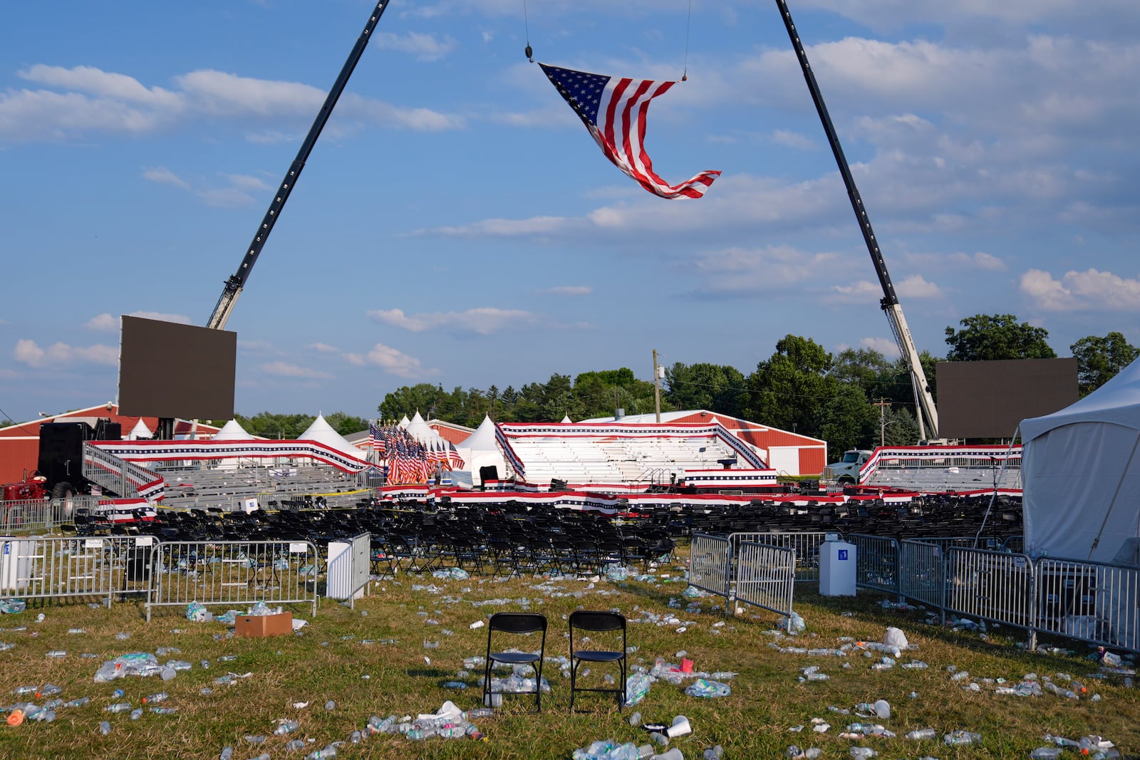 FILE - A campaign rally site for Republican presidential candidate former President Donald Trump is empty and littered with debris July 13, 2024, in Butler, Pa. (AP Photo/Evan Vucci, File)