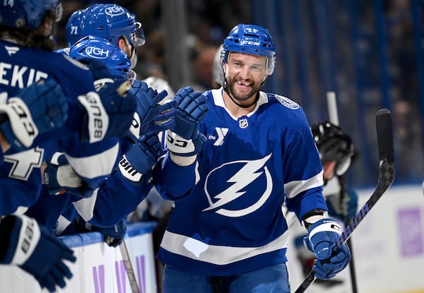 Tampa Bay Lightning center Luke Glendening (11) celebrates after his short-handed goal during the first period of an NHL hockey game against the Colorado Avalanche, Monday, Nov. 25, 2024, in Tampa, Fla. (AP Photo/Jason Behnken)