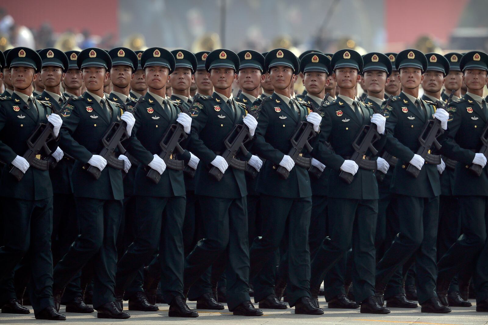 FILE - Members of China's People's Liberation Army (PLA) Rocket Force march in formation during a parade to commemorate the 70th anniversary of the founding of Communist China in Beijing, Tuesday, Oct. 1, 2019. (AP Photo/Mark Schiefelbein, File)