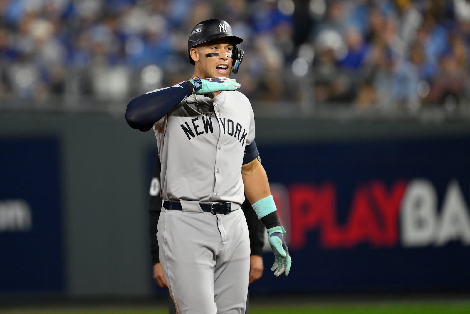 New York Yankees' Aaron Judge celebrates after hitting a double during the sixth inning in Game 4 of an American League Division baseball playoff series against the Kansas City Royals Thursday, Oct. 10, 2024, in Kansas City, Mo. (AP Photo/Reed Hoffmann)