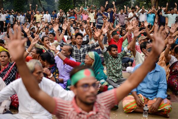 Bangladesh Hindus shout slogans during a protest rally to demand that an interim government withdraw all cases against their leaders and protect them from attacks and harassment in Dhaka, Bangladesh, Saturday, Nov. 2, 2024. (AP Photo/Mahmud Hossain Opu)