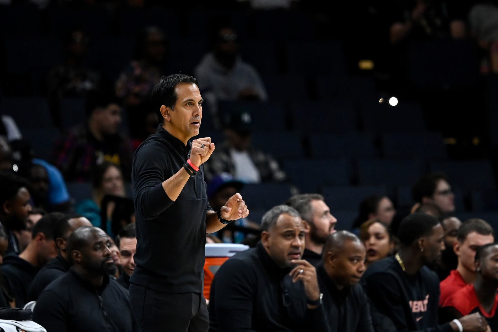 Miami Heat head coach Erik Spoelstra looks on during the second half of an NBA preseason basketball game against the Charlotte Hornets, Tuesday, Oct. 8, 2024, in Charlotte, N.C. (AP Photo/Matt Kelley)