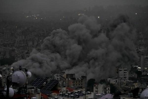 Smoke rises after an Israeli airstrike on Dahiyeh, in Beirut, Lebanon, Monday, Nov. 25, 2024. (AP Photo/Bilal Hussein)