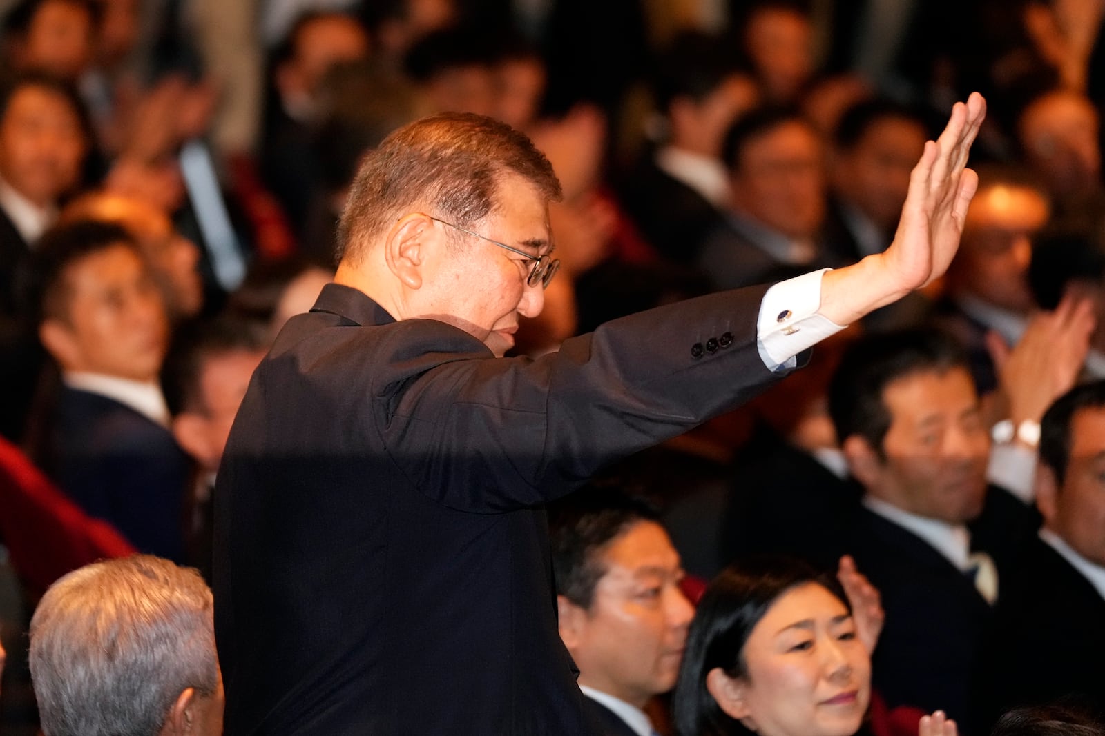 Shigeru Ishiba acknowledges after he was elected as new head of Japan's ruling party at the Liberal Democratic Party's (LDP) leadership election Friday, Sept. 27, 2024, at the party headquarters in Tokyo. (AP Photo/Hiro Komae, Pool)