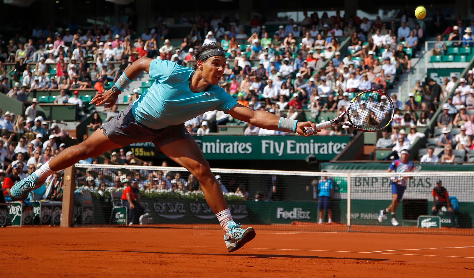 FILE - Spain's Rafael Nadal returns the ball during the third round match of the French Open tennis tournament against Argentina's Leonardo Mayer at the Roland Garros stadium, in Paris, France, Saturday, May 31, 2014, as he has announced he will retire from tennis at age 38 following the Davis Cup finals in November. (AP Photo/Michel Euler, File)