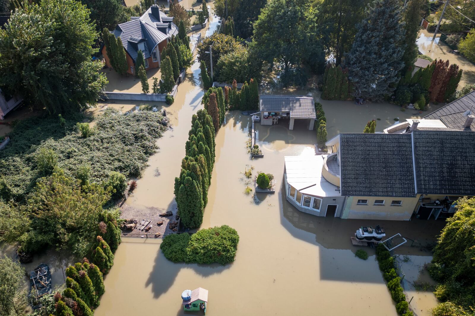 An aerial view of a flooded neighbourhood in Szentendre, Hungary, Thursday, Sept. 19, 2024. (AP Photo/Darko Bandic)