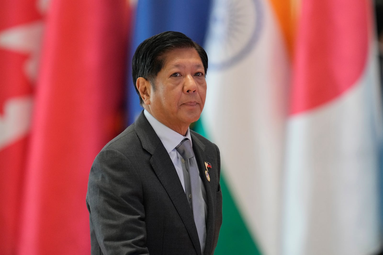 Philippines President Ferdinand Marcos Jr. arrives to participate in ASEAN-China summit in Vientiane, Laos, Thursday, Oct. 10, 2024. (AP Photo/Sakchai Lalit)