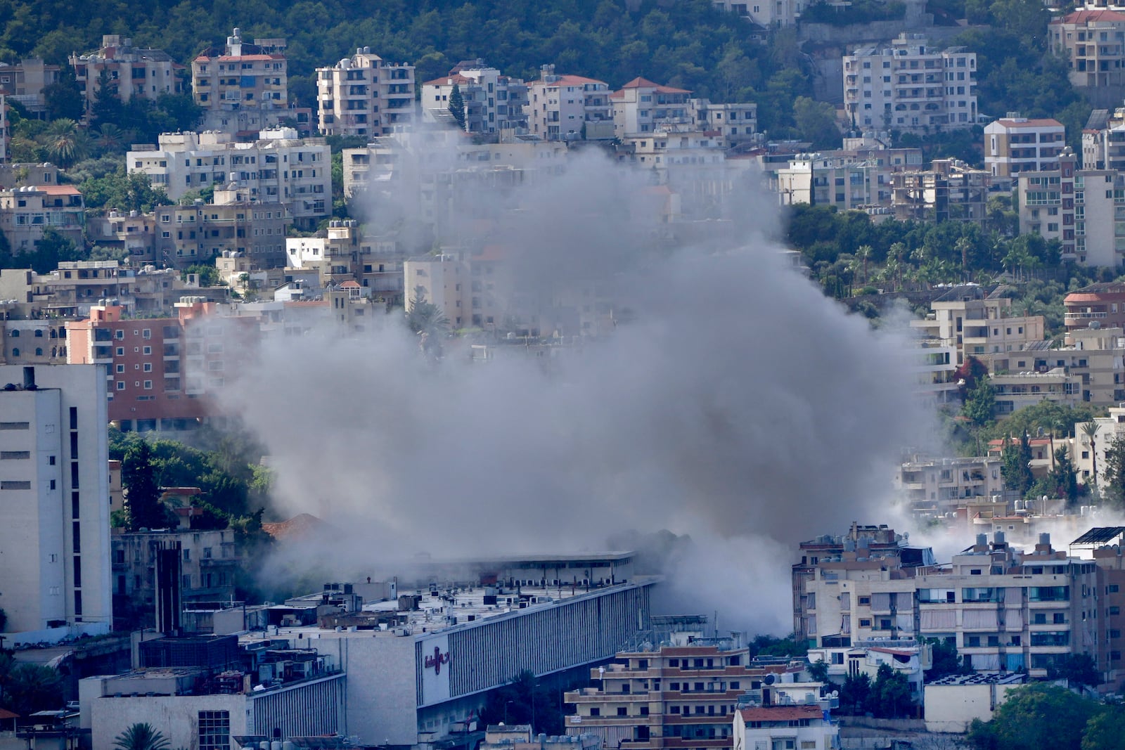 Smoke rises from an Israeli airstrike in Choueifat, south of Beirut, Lebanon, Wednesday, Oct. 2, 2024. (AP Photo/Hussein Malla)