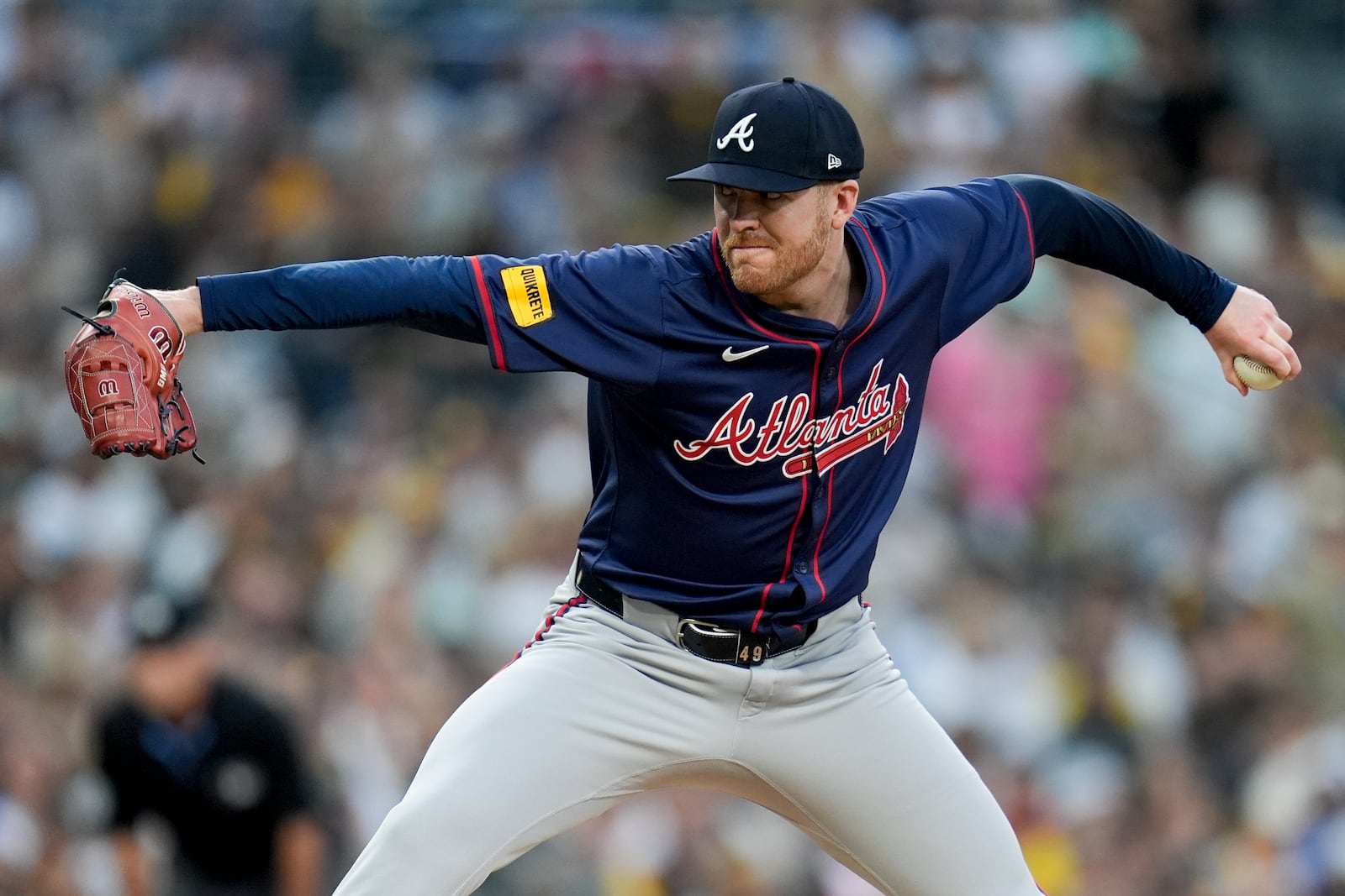 Atlanta Braves relief pitcher Aaron Bummer throws to a San Diego Padres batter during the second inning in Game 1 of an NL Wild Card Series baseball game Tuesday, Oct. 1, 2024, in San Diego. (AP Photo/Gregory Bull)