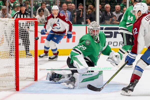 Colorado Avalanche left wing Artturi Lehkonen (62) scores past Dallas Stars goaltender Jake Oettinger (29) during the second period of Game 5 of a first-round NHL hockey playoff series in Dallas, Monday, April 28, 2025. (AP Photo/Gareth Patterson)