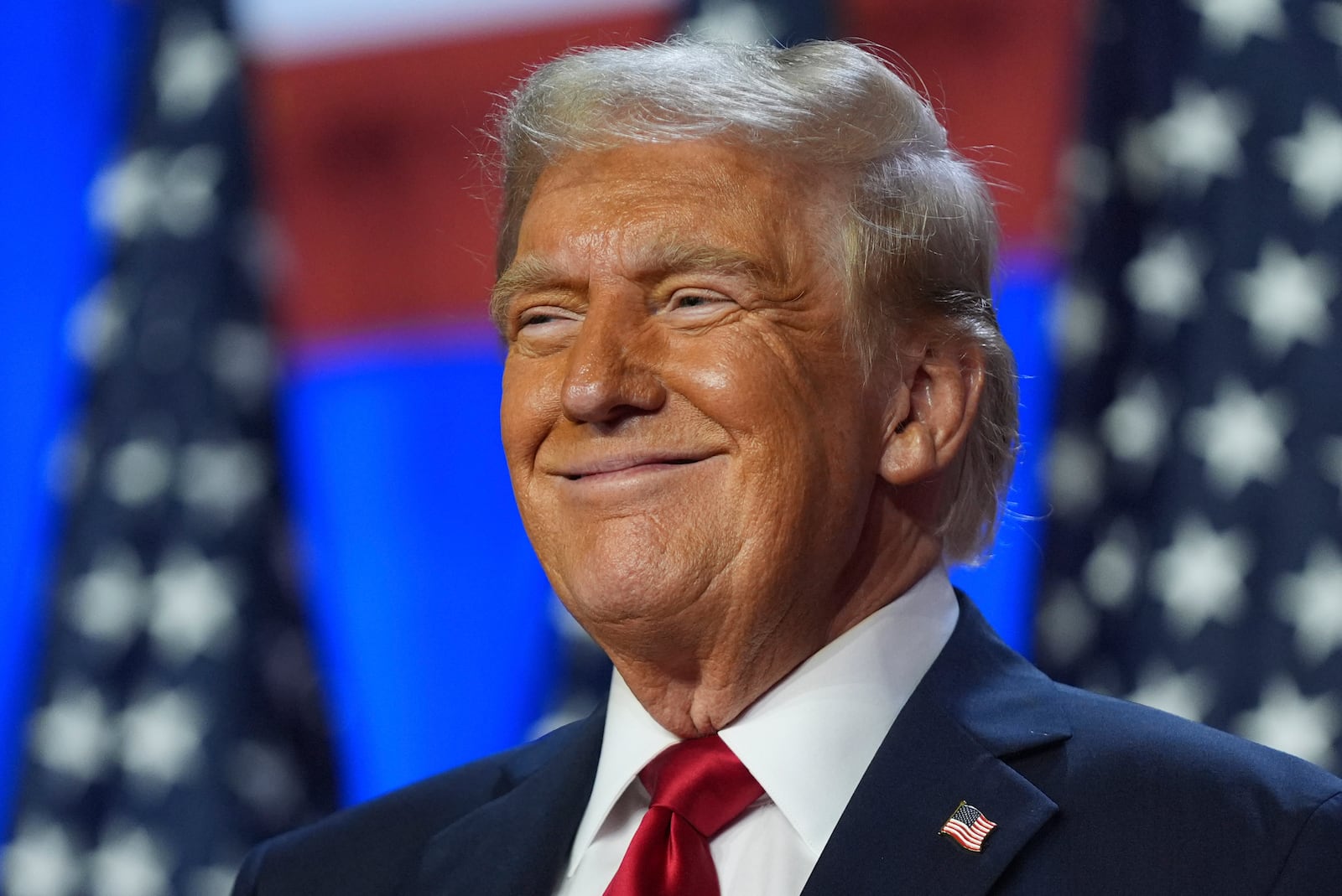 Republican presidential nominee former President Donald Trump smiles at an election night watch party at the Palm Beach Convention Center, Wednesday, Nov. 6, 2024, in West Palm Beach, Fla. (AP Photo/Evan Vucci)