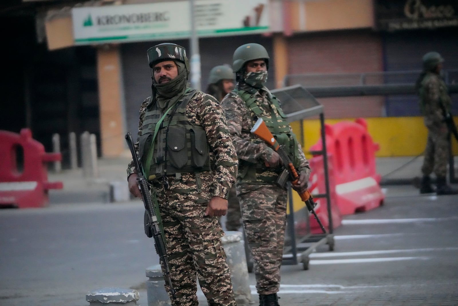 Indian soldiers guard during the Kashmir Marathon in Srinagar, Indian controlled Kashmir, Sunday, Oct. 20, 2024. (AP Photo/Mukhtar Khan)