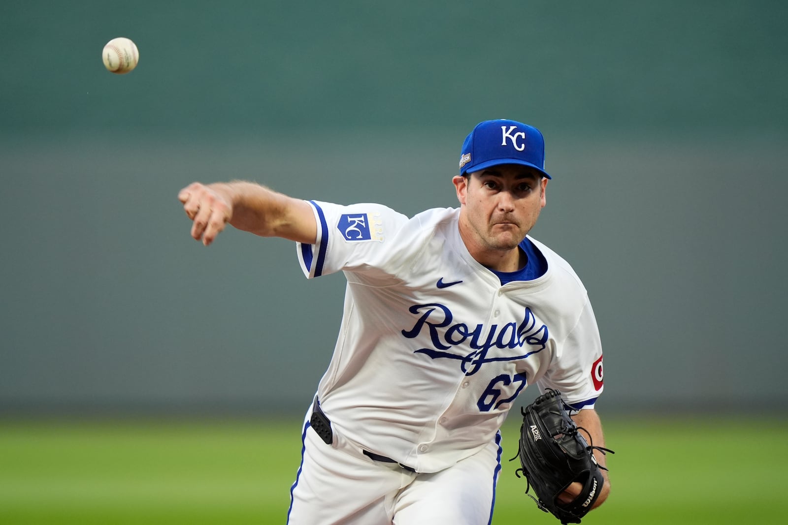 Kansas City Royals starting pitcher Seth Lugo throws during the first inning in Game 3 of an American League Division baseball playoff series against the New York Yankees Wednesday, Oct. 9, 2024, in Kansas City, Mo. (AP Photo/Charlie Riedel)