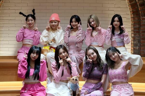 FILE - South Korean K-pop group TWICE poses for a photo after an interview in Seoul, South Korea, Wednesday, Nov. 10, 2021. (AP Photo/Lee Jin-man, File)