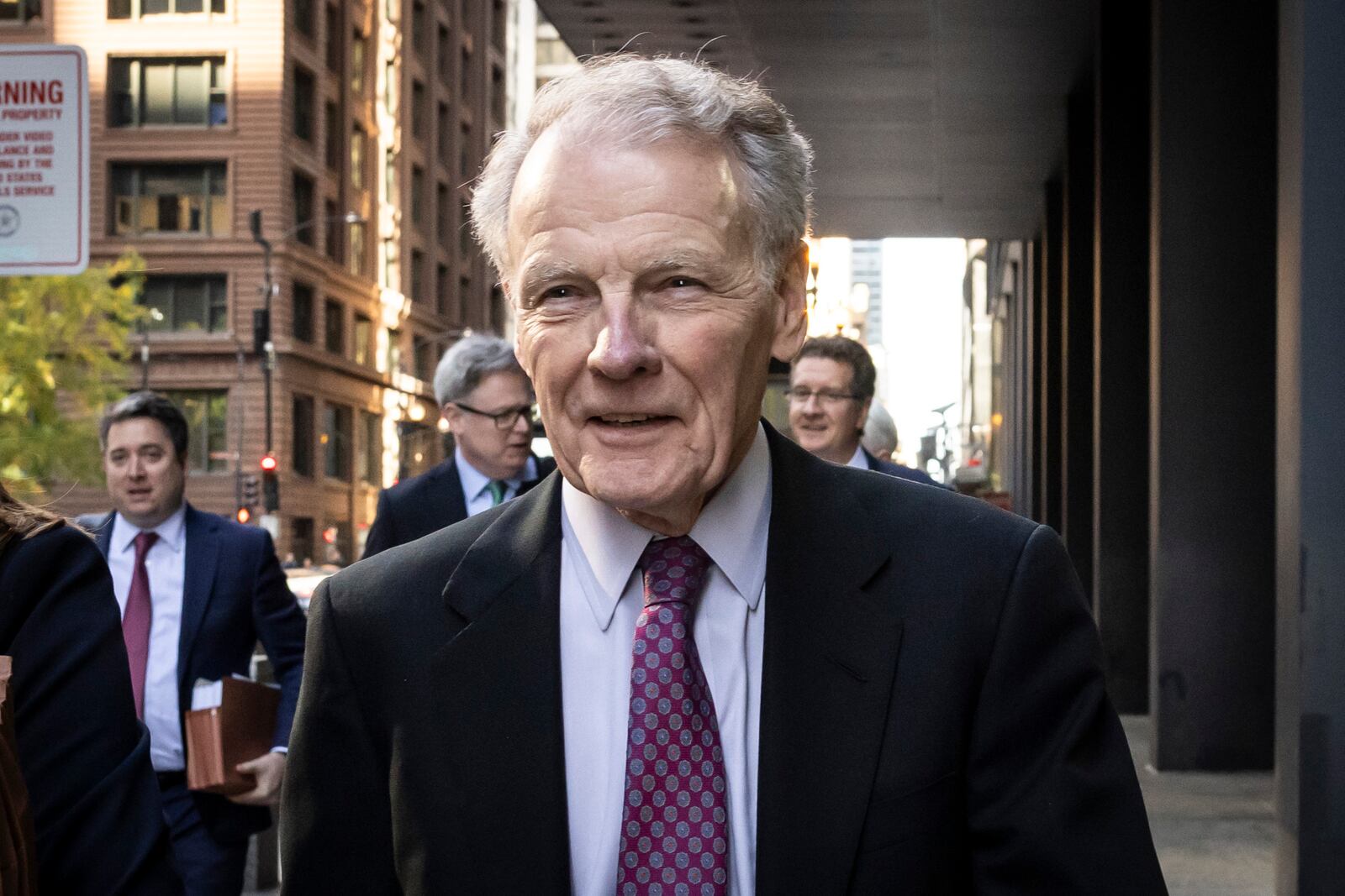 Illinois' former House Speaker Michael Madigan, charged in a multimillion-dollar racketeering and bribery scheme that included the state’s largest utility, ComEd, walks out of the Dirksen Federal Courthouse, Wednesday, Oct. 9, 2024 in Chicago. (Ashlee Rezin/Chicago Sun-Times via AP)