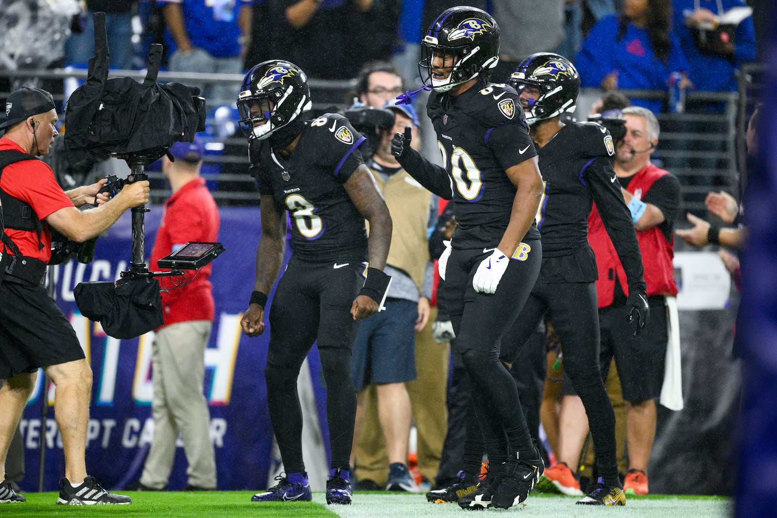 Baltimore Ravens quarterback Lamar Jackson (8) reacts onto a camera operator after scoring on a run against the Buffalo Bills during the second half of an NFL football game, Sunday, Sept. 29, 2024, in Baltimore. (AP Photo/Nick Wass)