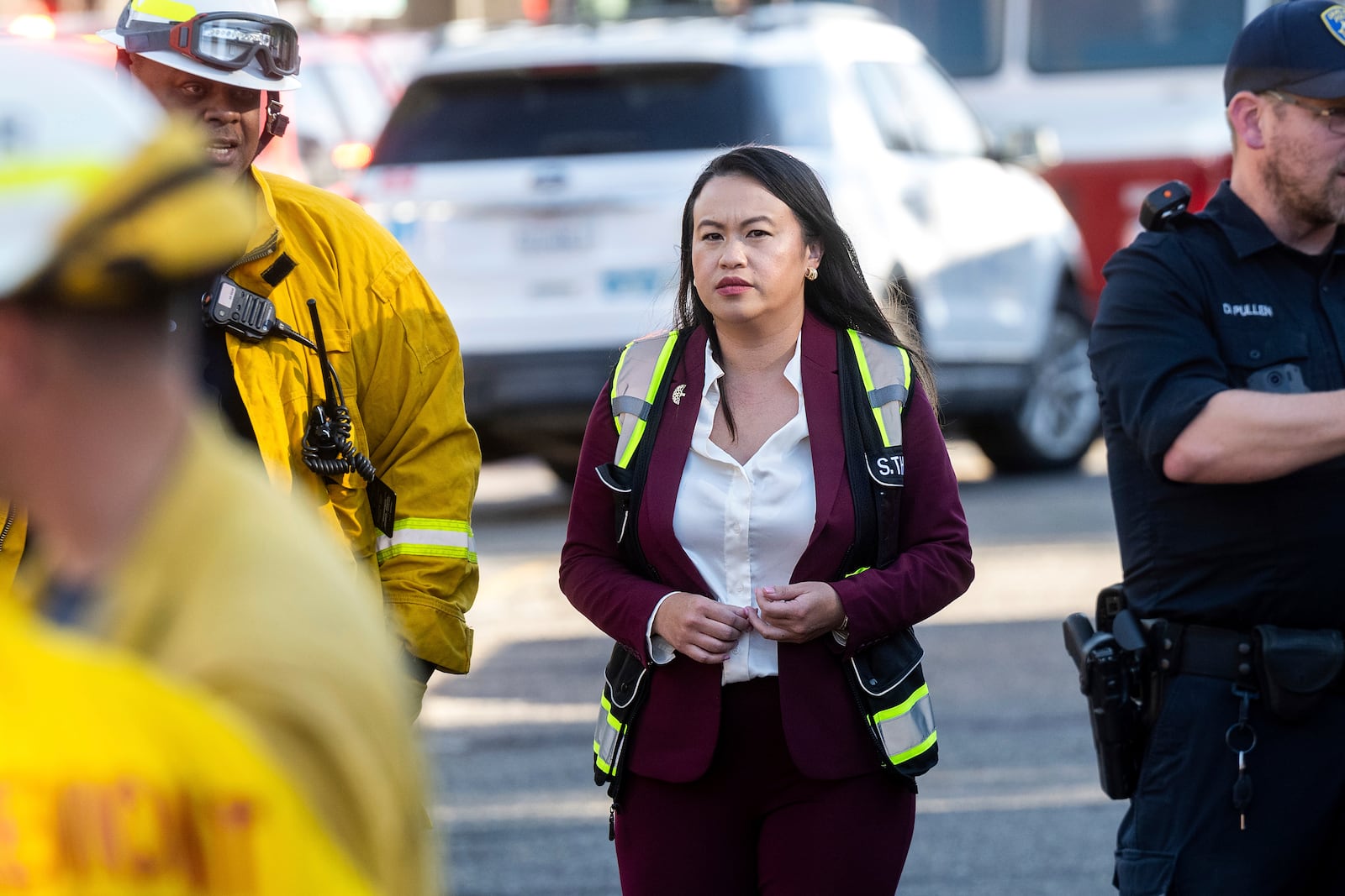 Oakland Mayor Sheng Thao visits emergency responders battling the Keller Fire in Oakland, Calif., Friday, Oct. 18, 2024. (AP Photo/Noah Berger)